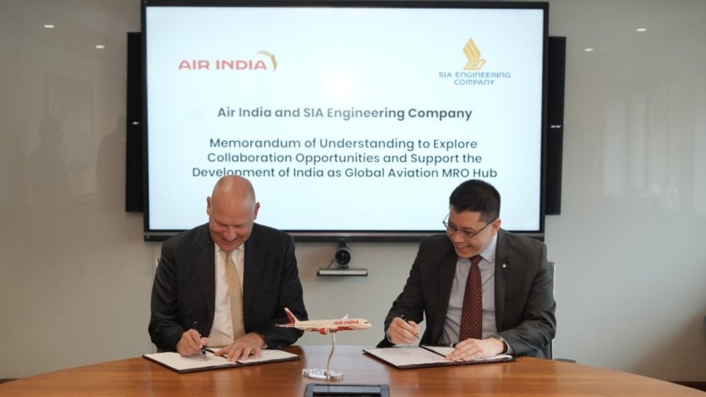 (L-R) Air India CEO & MD Campbell Wilson and SIAEC CEO Chin Yau Seng sign and exchange an MoU in Mumbai.  MoU to explore partnership to contribute towards developing India as a global aviation MRO hub