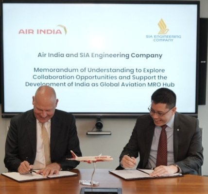 (L-R) Air India CEO & MD Campbell Wilson and SIAEC CEO Chin Yau Seng sign and exchange an MoU in Mumbai. MoU to explore partnership to contribute towards developing India as a global aviation MRO hub