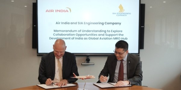 (L-R) Air India CEO & MD Campbell Wilson and SIAEC CEO Chin Yau Seng sign and exchange an MoU in Mumbai. MoU to explore partnership to contribute towards developing India as a global aviation MRO hub
