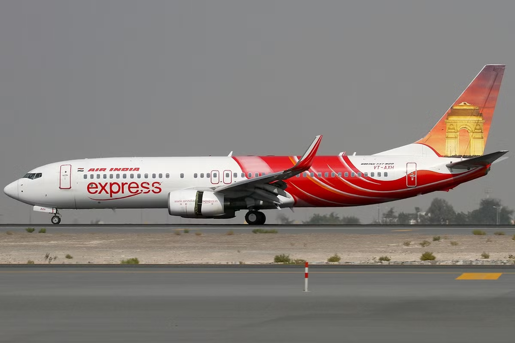 Passengers Seen Standing in Aisle While Plane Was Moving